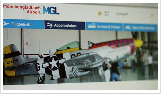 Corporate Website in responsive Webdesign für Mönchengladbach Flughaben by bgp e.media - Sliderbild Airport erleben